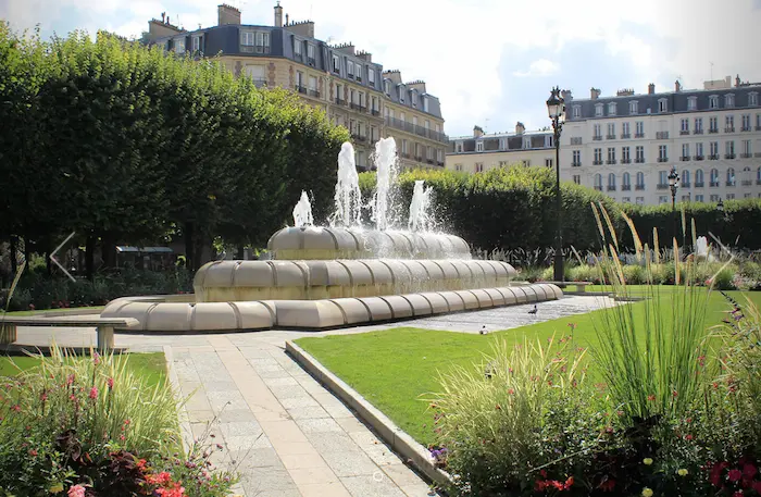 Professional office building entrance of Mateerz France headquarters, 64 Rue Anatole France Levallois-Perret Paris region, providing fractional CMO and interim marketing leadership services across France